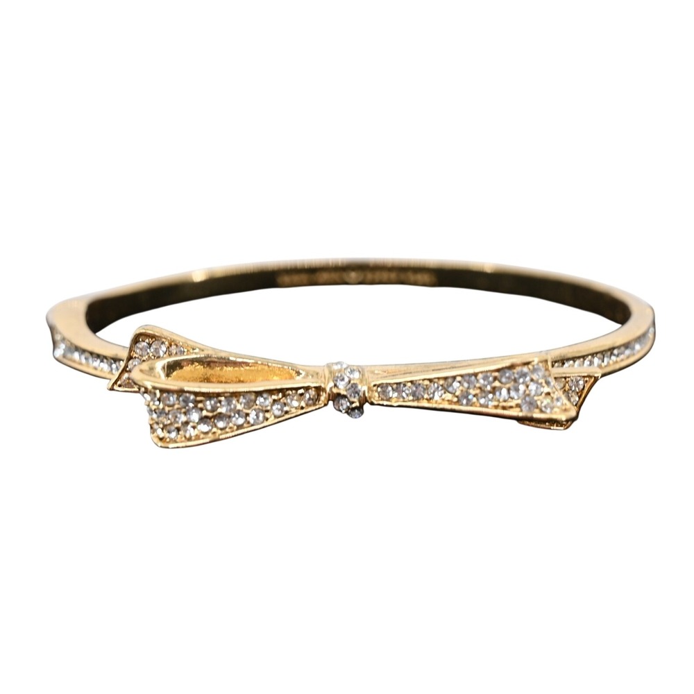 Kate Spade New York Gold Tone Crystal Pave Bow Hinged Bangle Bracelet